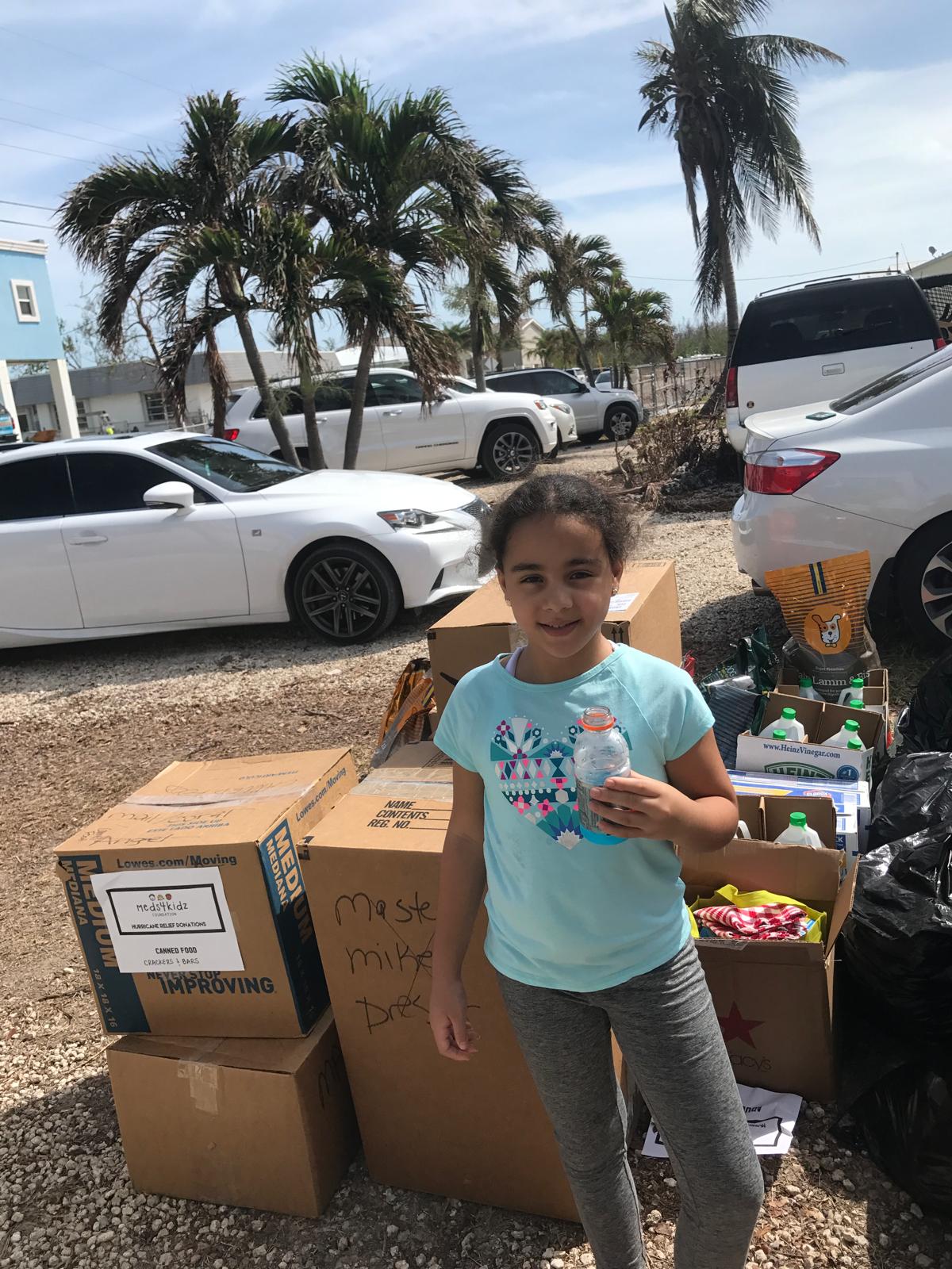 Ariela Tejada with Meds4Kidz Hurricane Relief Donation Boxes